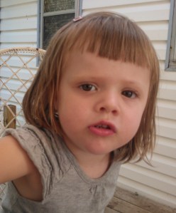 July 2012 eyes aligned - hair growing!