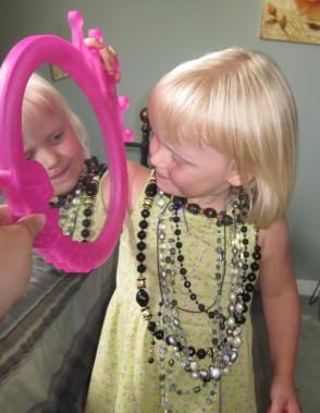 "All mommy's necklaces!" July 2011