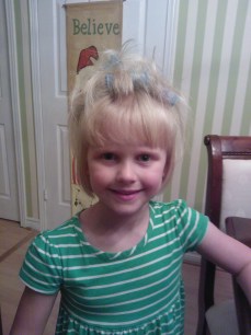 Putting my curlers in her hair, "so I can look like momma!"