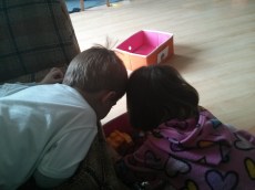 Eric & Elise picking out some cars to play with