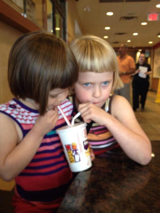 a rare moment of sisterly love captured by my friend while I was gone